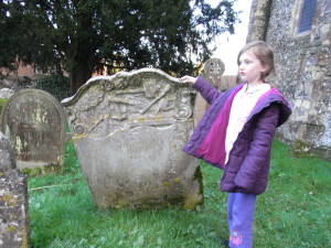 Exploring Gransden graves in Cobham Kent. Richard Gransden died 1760, Cobham Kent, UK.